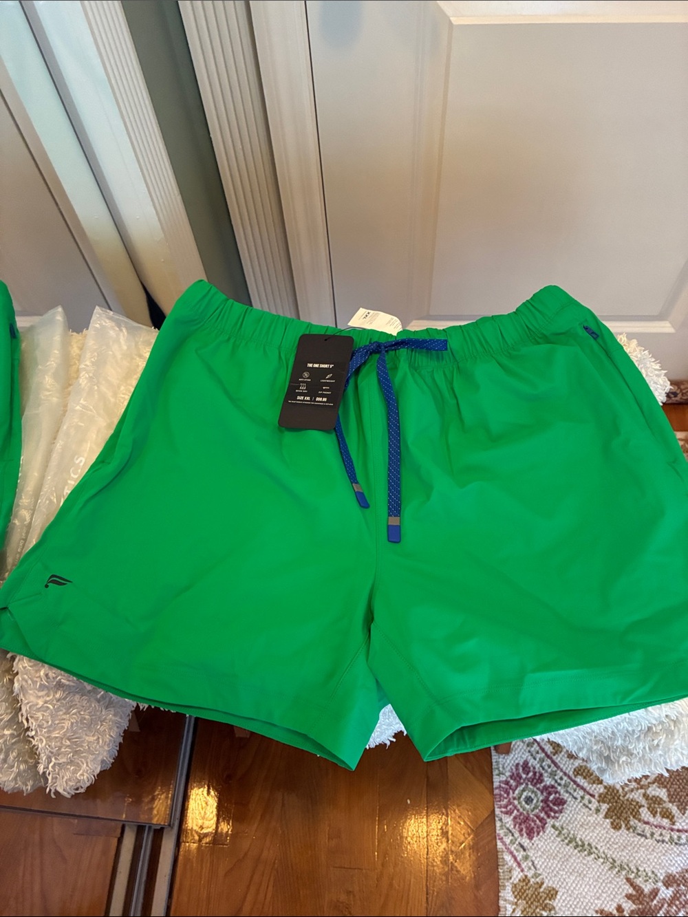 Fabletics Men's Bright Green Swim Trunks with Blue Drawstring/pockets